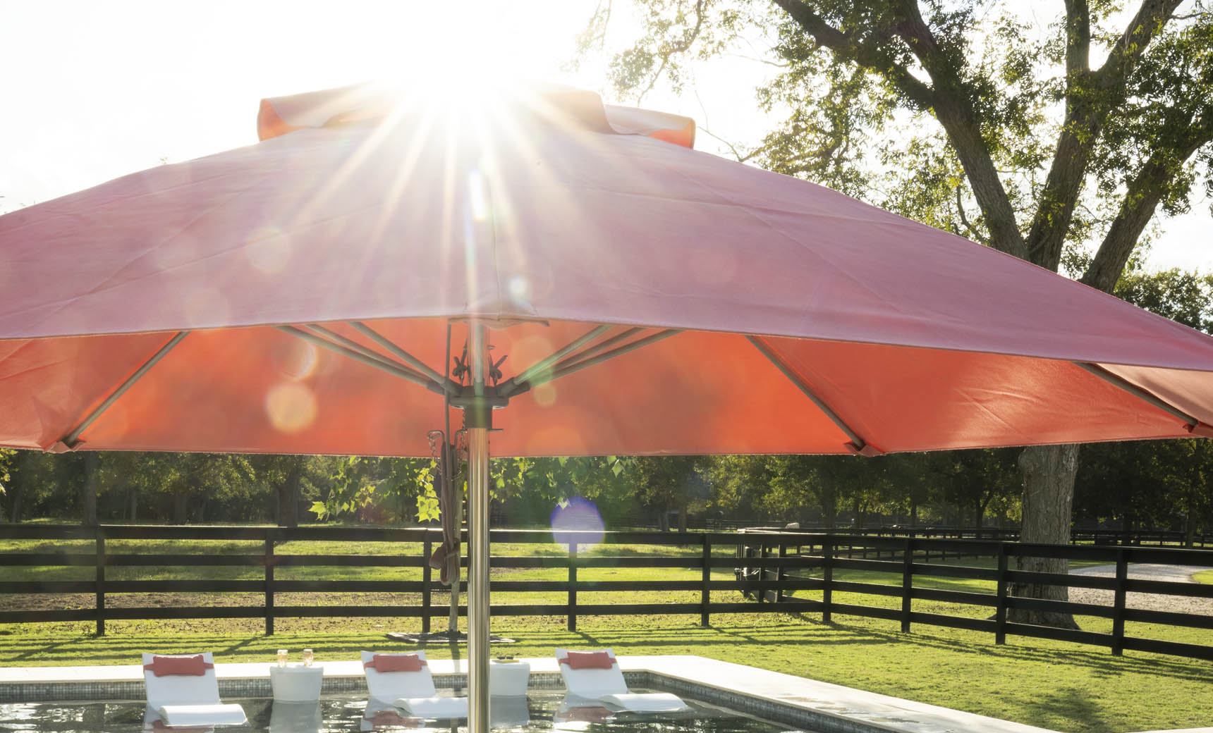 7.5-foot octagonal crank auto tilt essential fiberglass umbrella in white with wooden ribs and silver accents