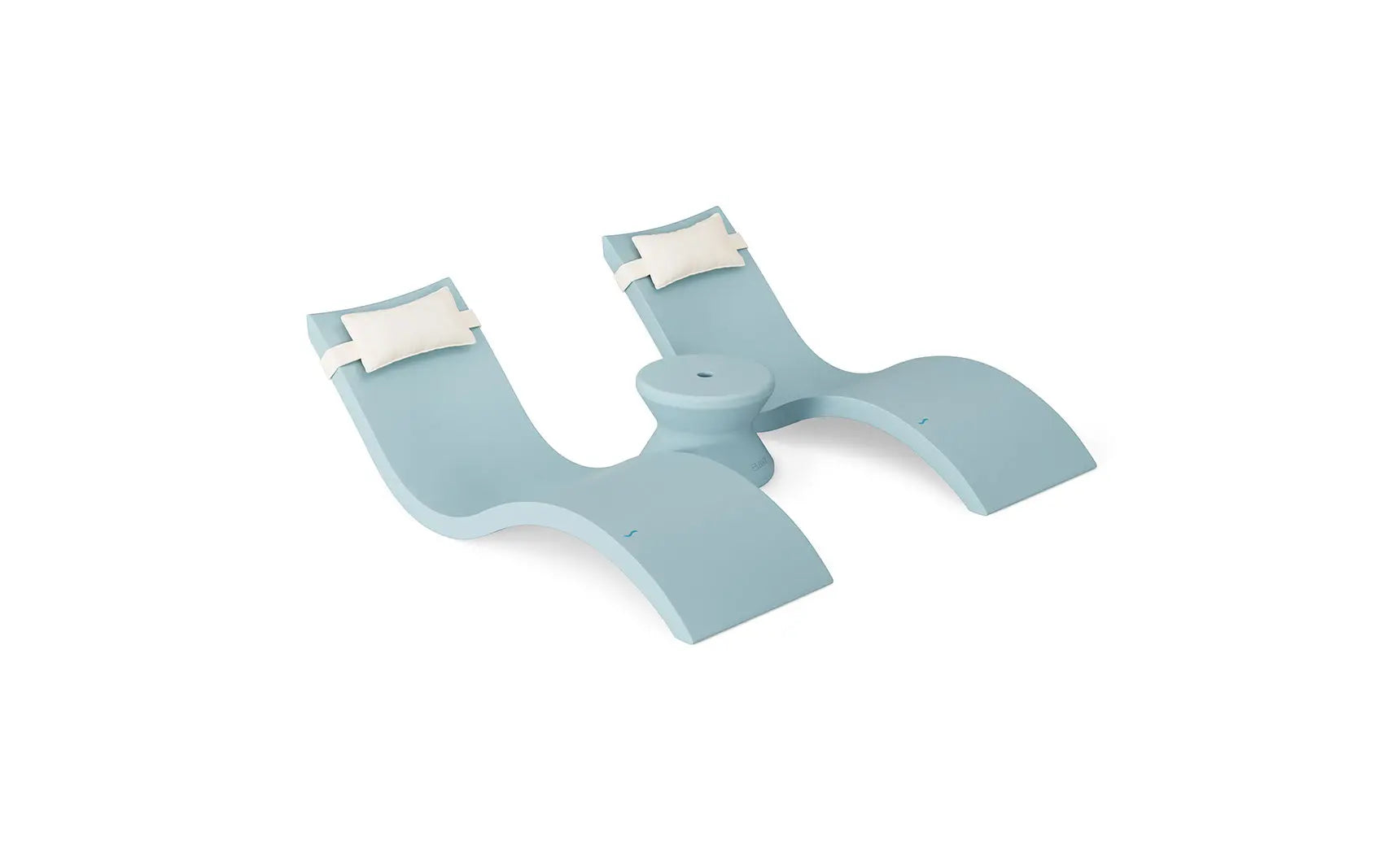 Signature chaise headrest pillow paired with a side table for in-pool use.