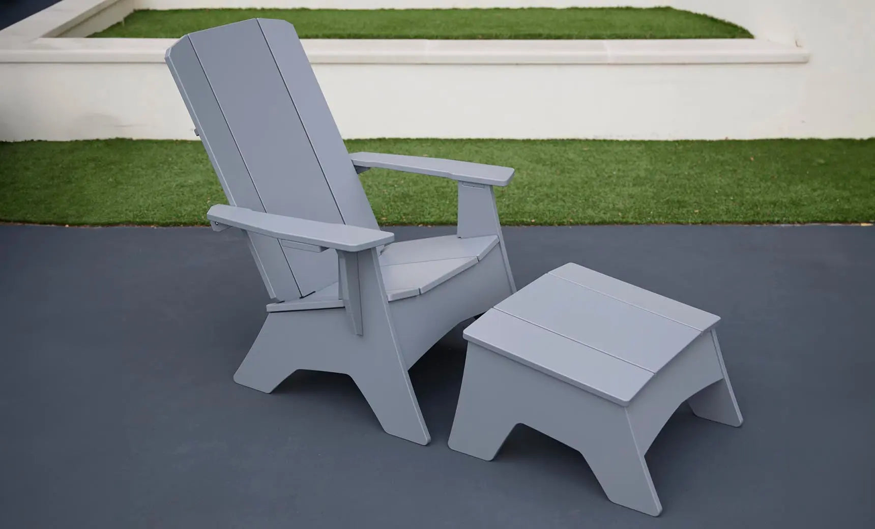 Mainstay Adirondack-style wooden ottoman with woven brown seat and matching arms.