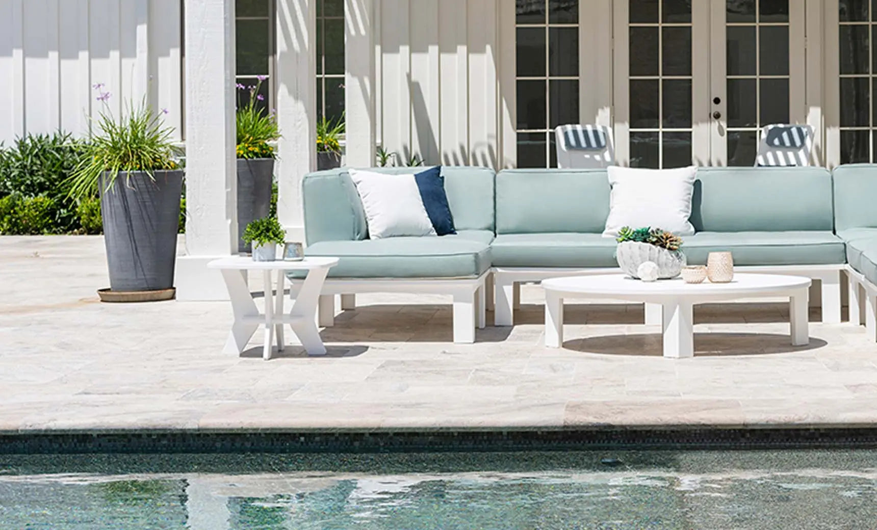 Mainstay sectional sofa with ottoman, featuring brown fabric and wooden legs.
