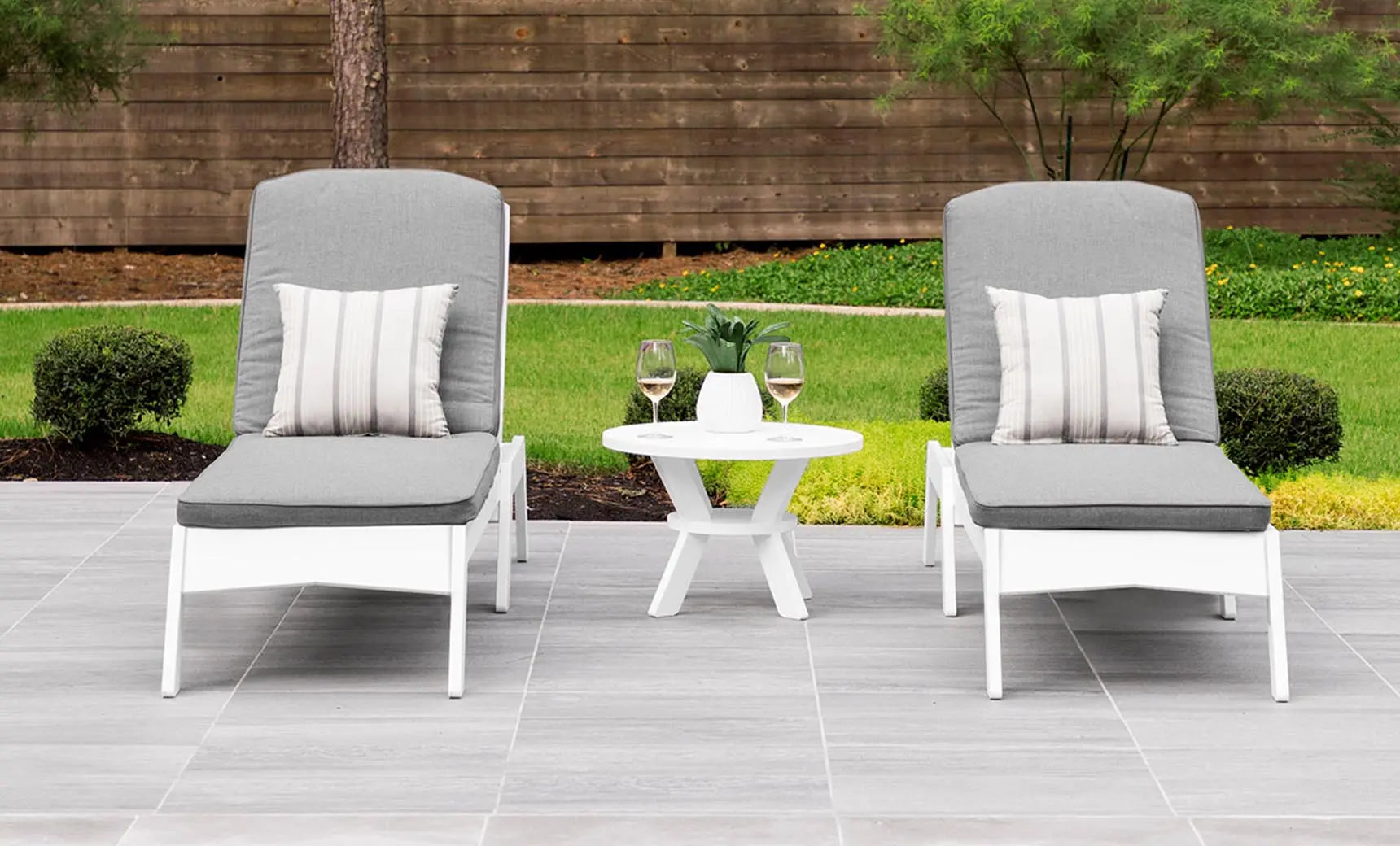 Mainstay round side table with a smooth surface and sleek design.
