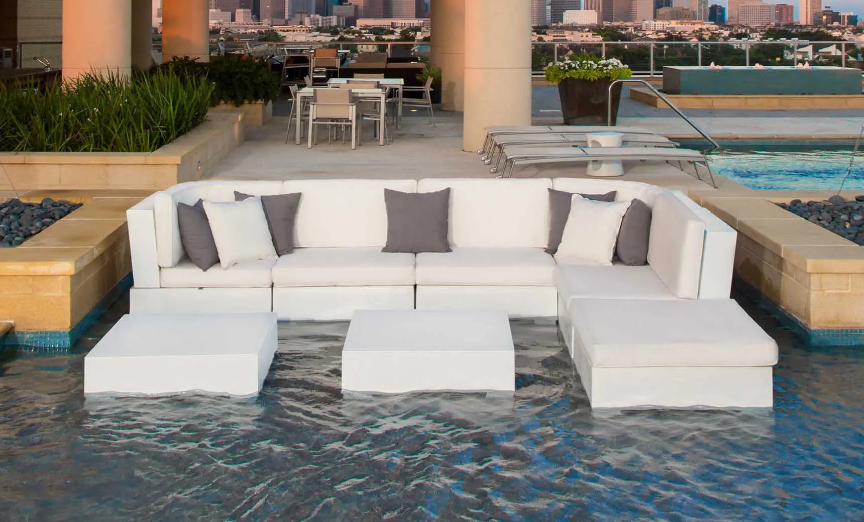 Signature coffee table with glass top and wooden legs in a modern design.