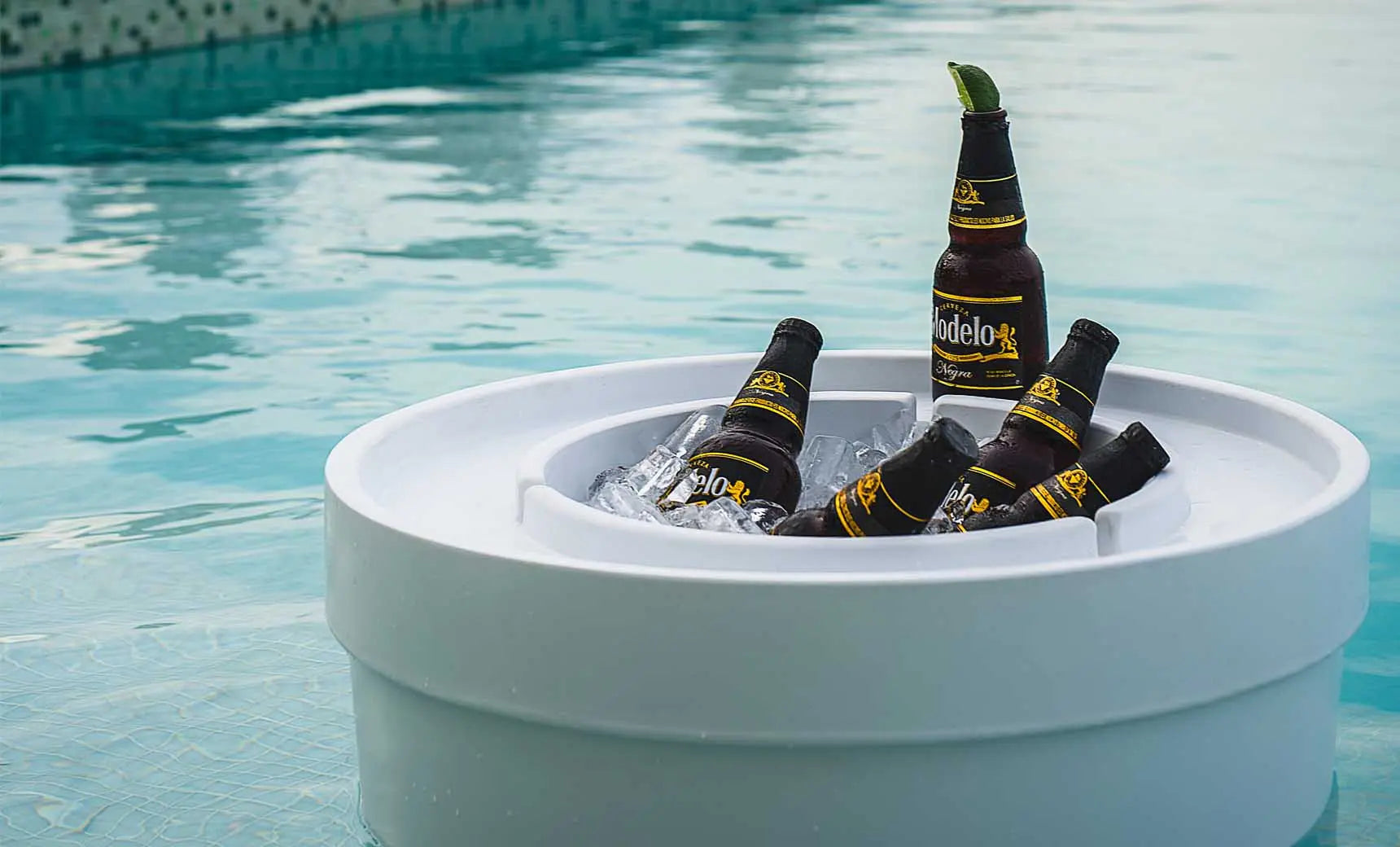 Signature Ice Basin with a clear, cylindrical design and a capacity of about 1.5 liters.