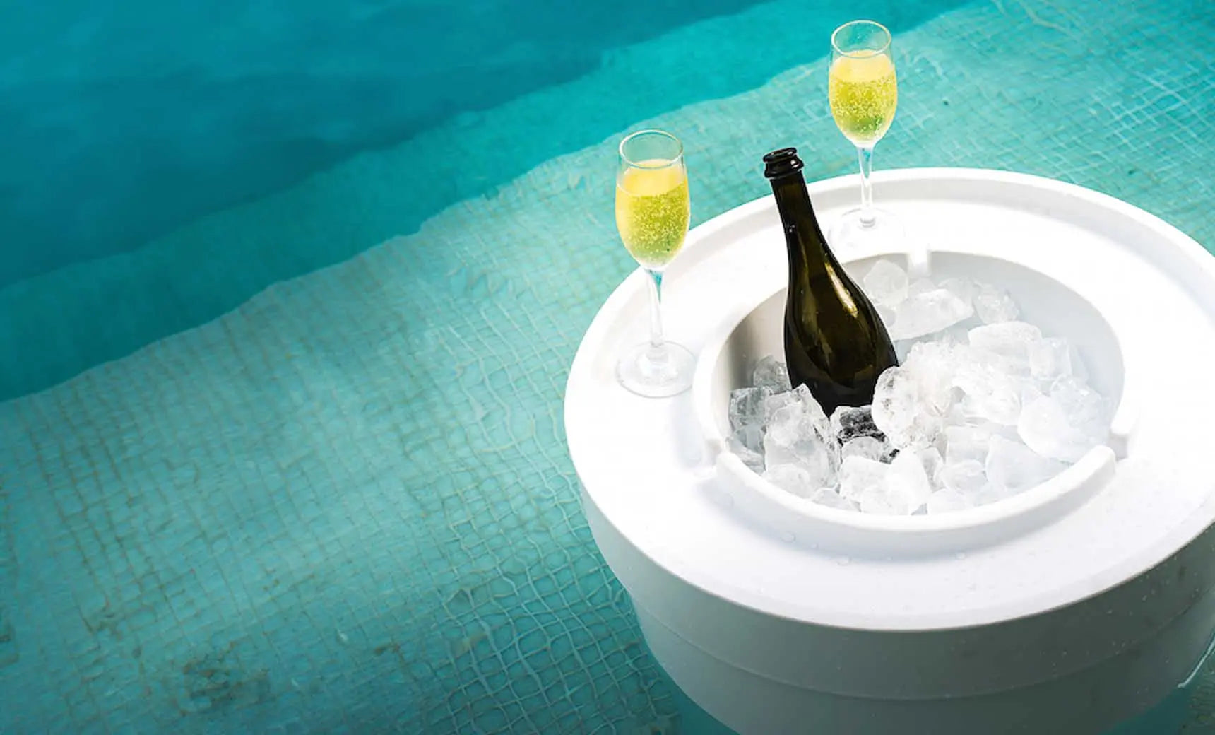 Signature Ice Basin with a clear, cylindrical design and a capacity of about 1.5 liters.