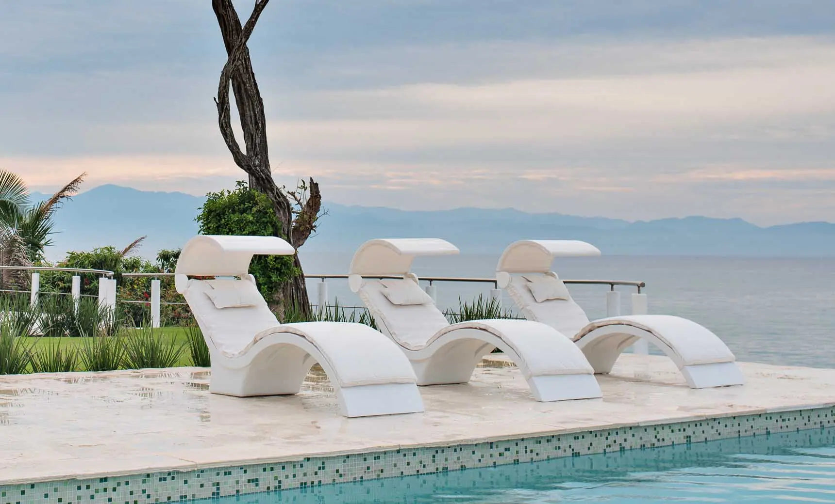 Signature chaise lounge cushion featuring soft, plush fabric in a modern design.