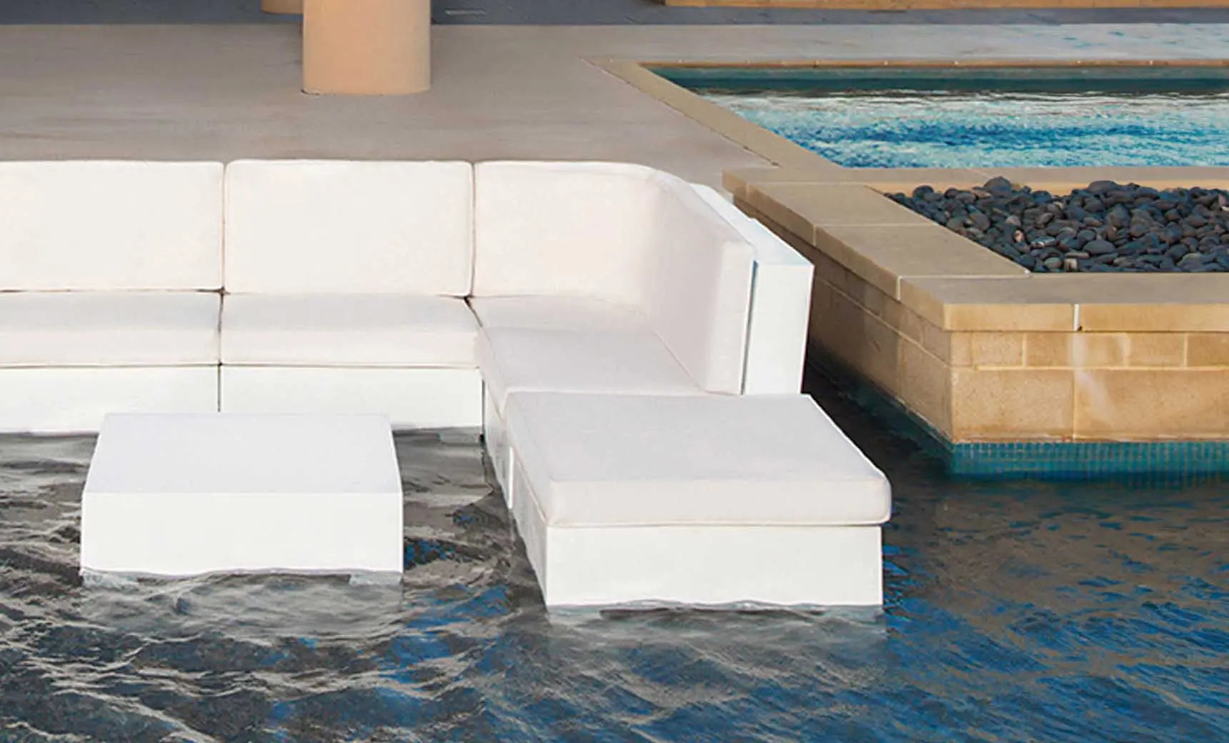 Signature Sectional Ottoman in gray fabric with wooden legs and an ottoman seat.