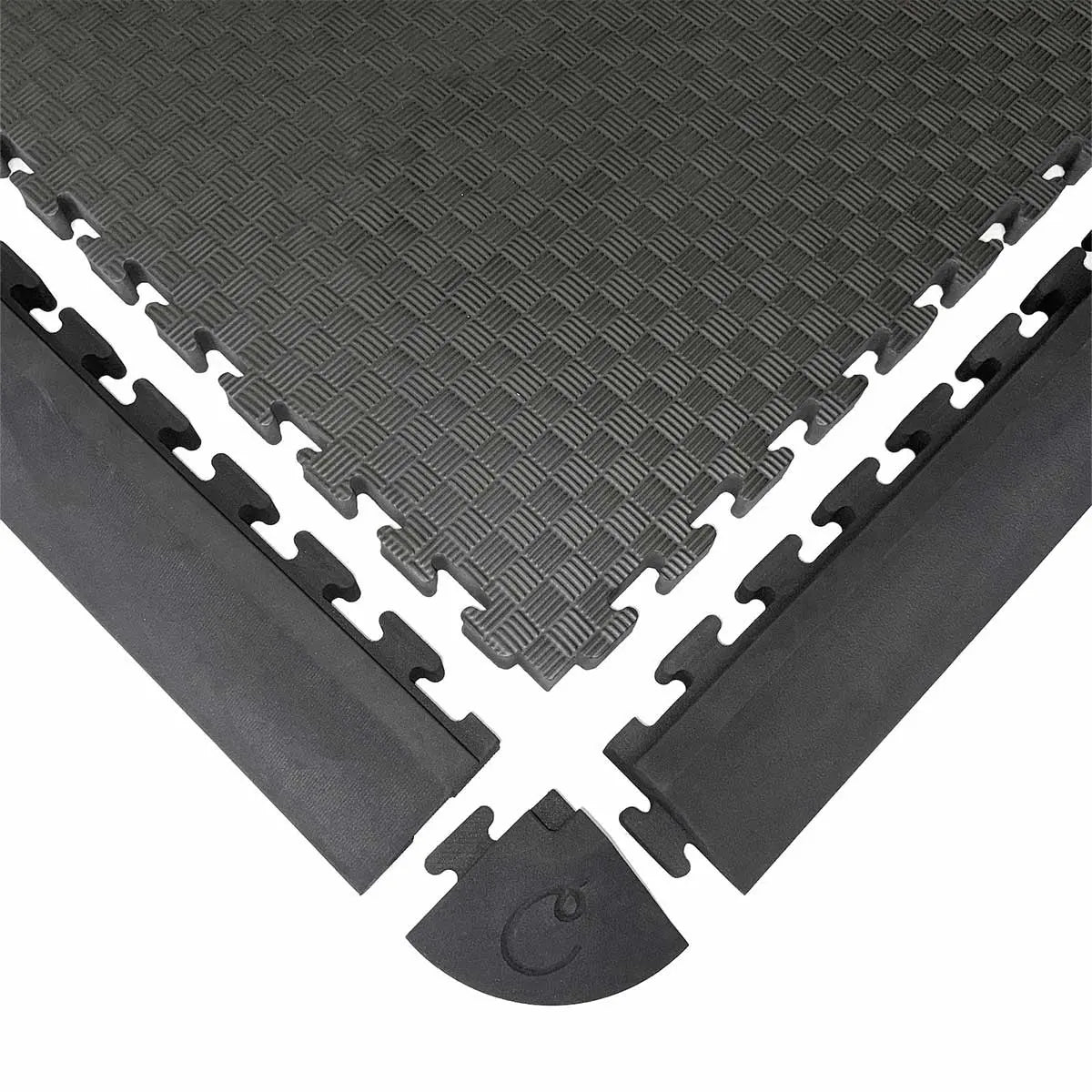 Interlocking cushioned floor tiles for golf simulator setup with turf surface and clean edges
