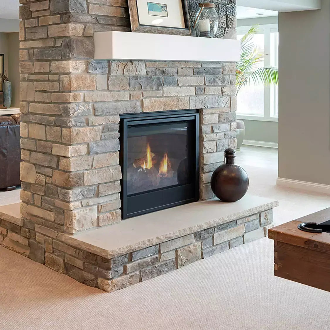 Majestic See-Through 36" direct vent gas fireplace with glass front and metal frame.