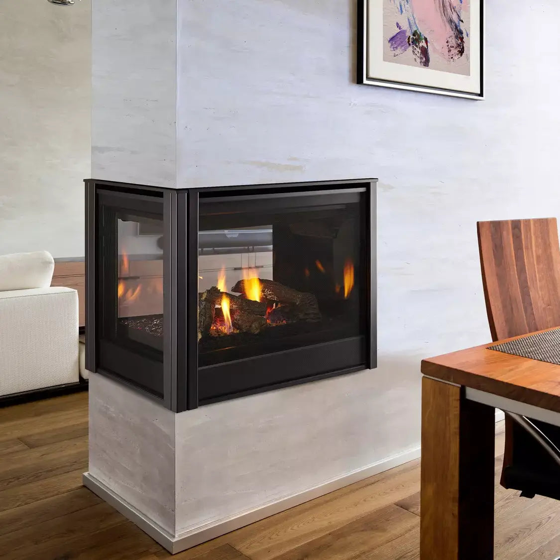 Majestic Pier 36-inch direct vent multi-sided gas fireplace with glass front and stone surround.