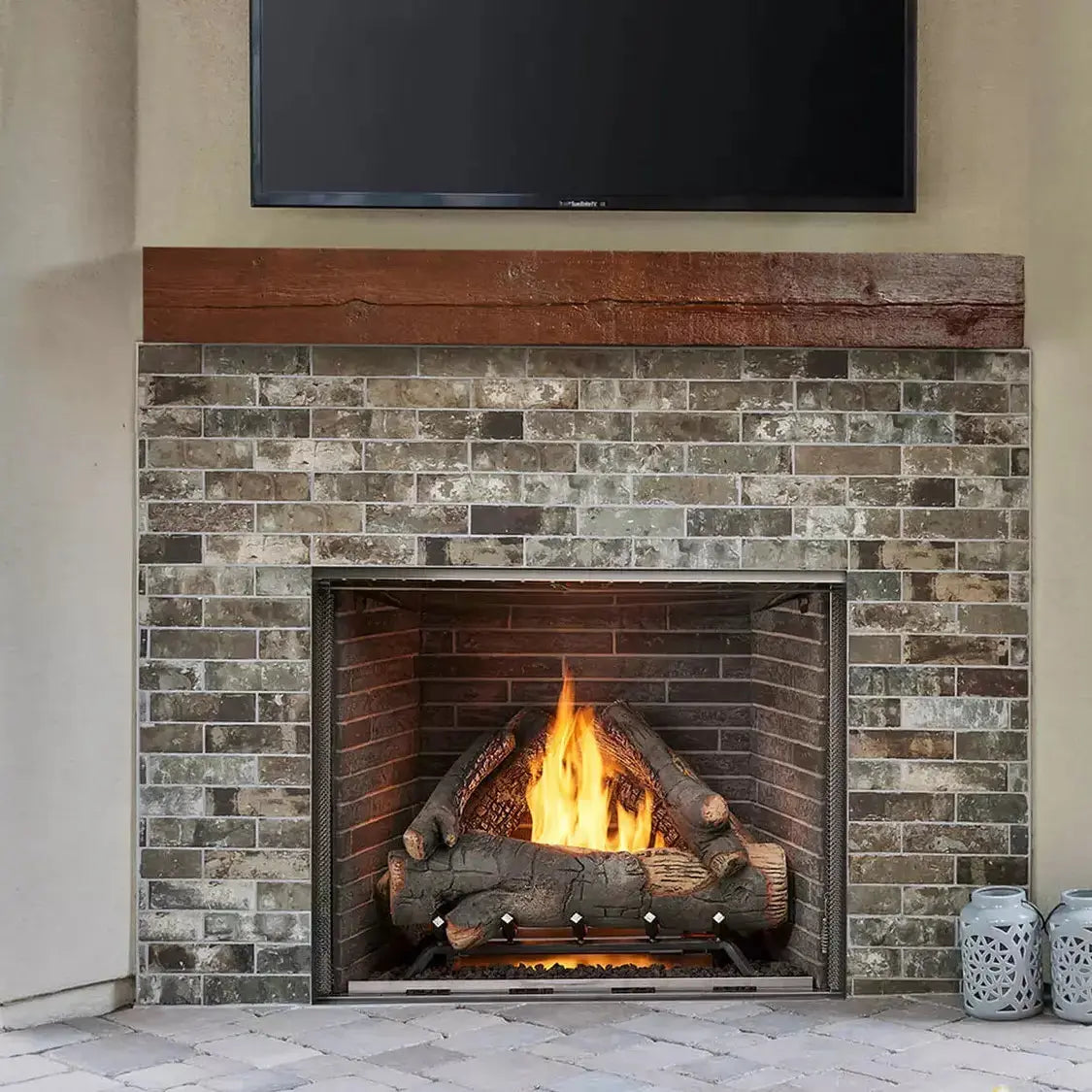Majestic Courtyard 42" outdoor gas fireplace with modern design and glass front panel.