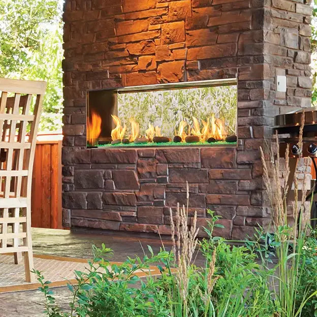 Majestic Lanai 48-inch see-through outdoor gas fireplace with stone front and modern design elements.