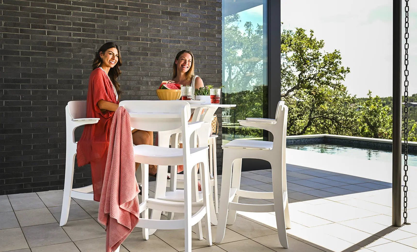 Haven high-top chair in modern design with wooden legs and upholstered seat and backrest.