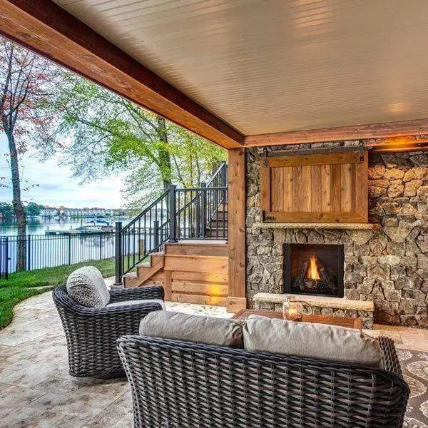Majestic Courtyard 36" outdoor gas fireplace with modern design and glass front panel.